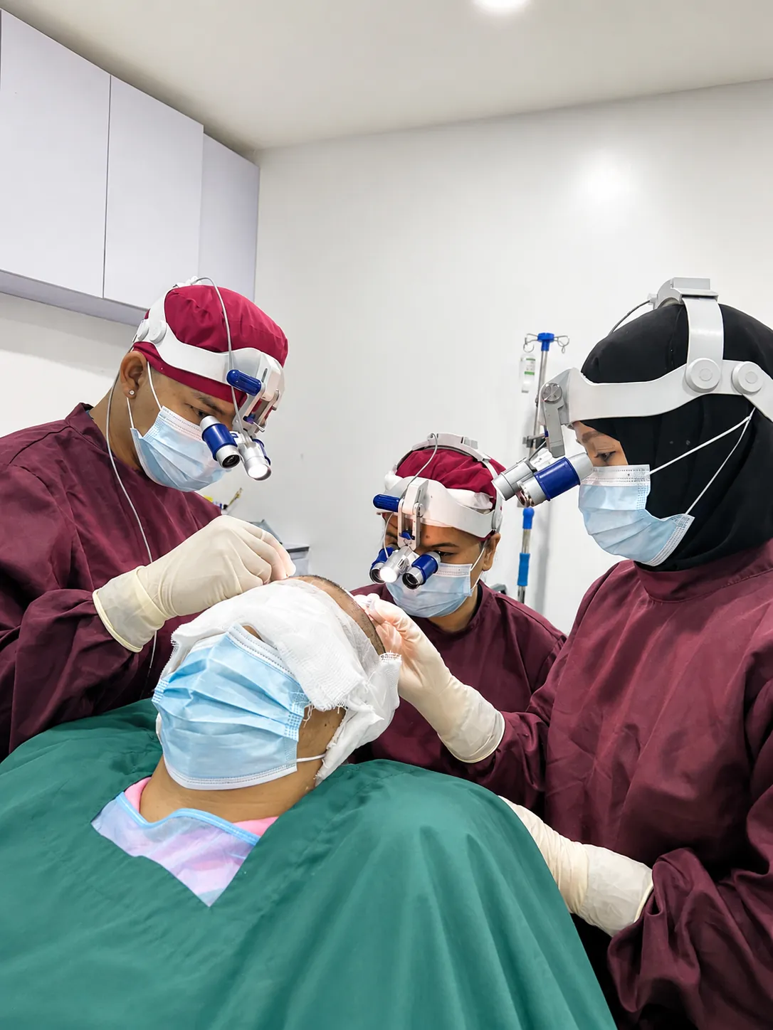 GraftLab clinical team training in a live hair transplant procedure